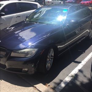 BMW 328i 2009 with 133000 miles on it